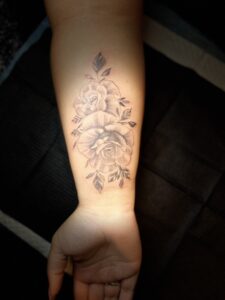 Roos onderarm tattoo
